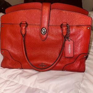 I’m selling a coach purse that is very well taken care of.